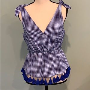 Blue gingham peplum top with tassel detail